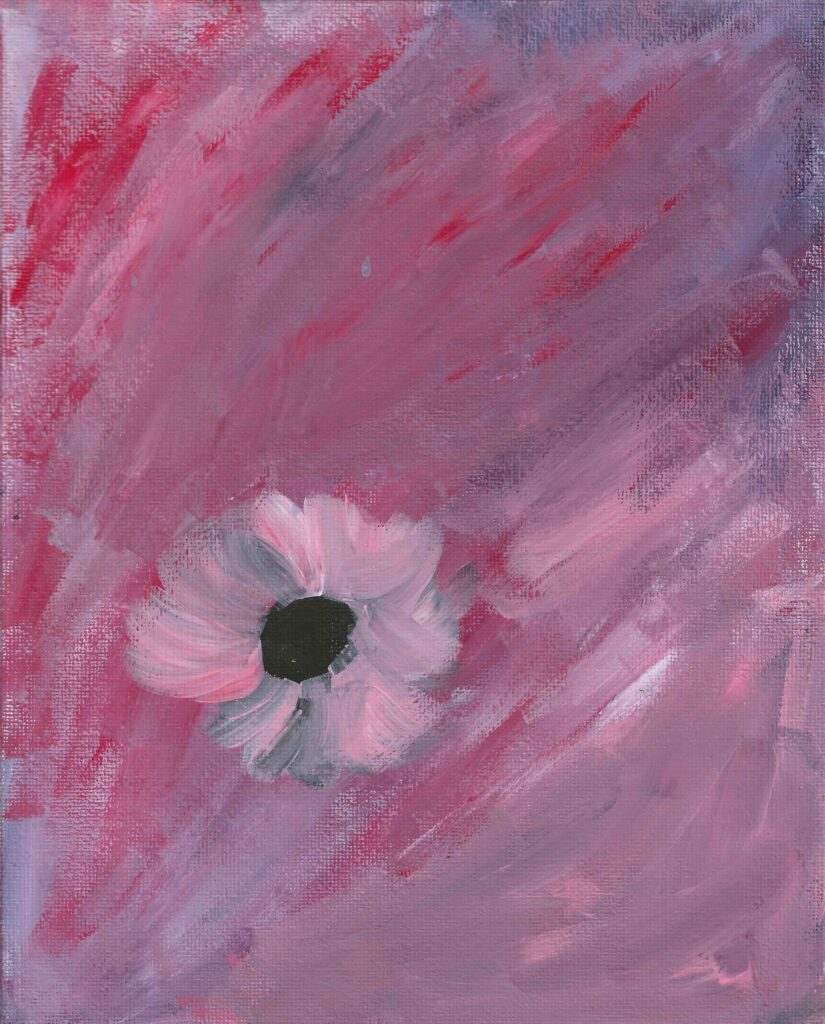 a pink flower on a moody background